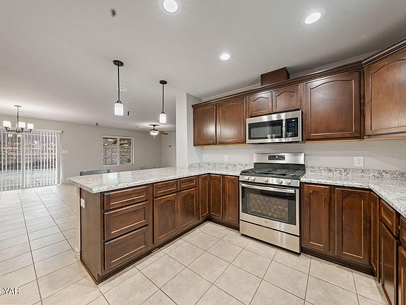4th image of 10253 E 34th St