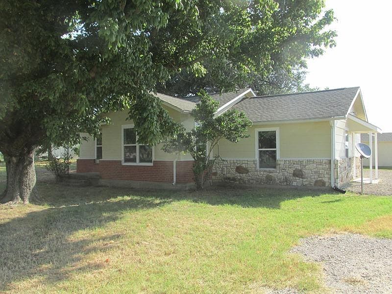 FRONT EXTERIOR - FACES WEST