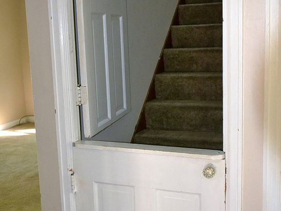 Leading up to the second floor is a split door.  The second floor contains 2 bedrooms, a half bath and a bonus room that could be either an additional bedroom or a second Living space.