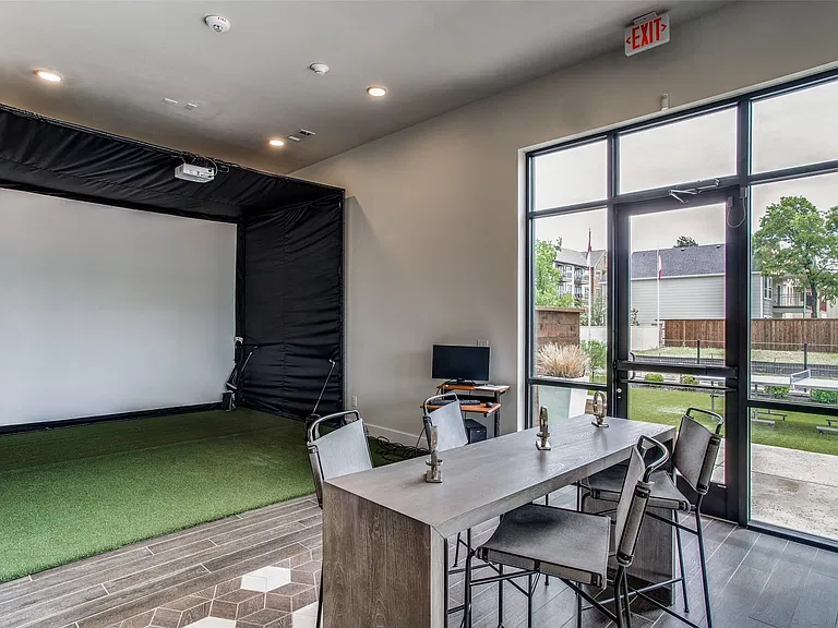 Area at Community Center with virtual golf area and more.