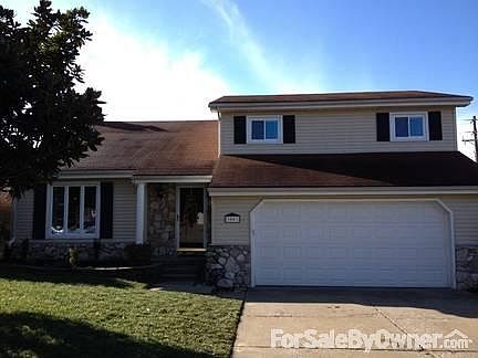 Front of House
						:
						Beautiful large magnolia tree in front yard. 1/2 lot on right side of driveway.