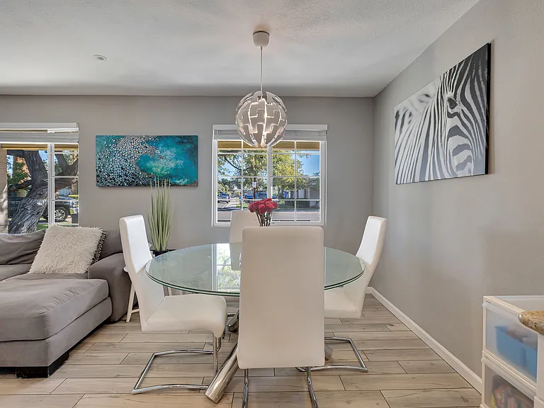 Open-concept living and dining area with seamless flow to the kitchen