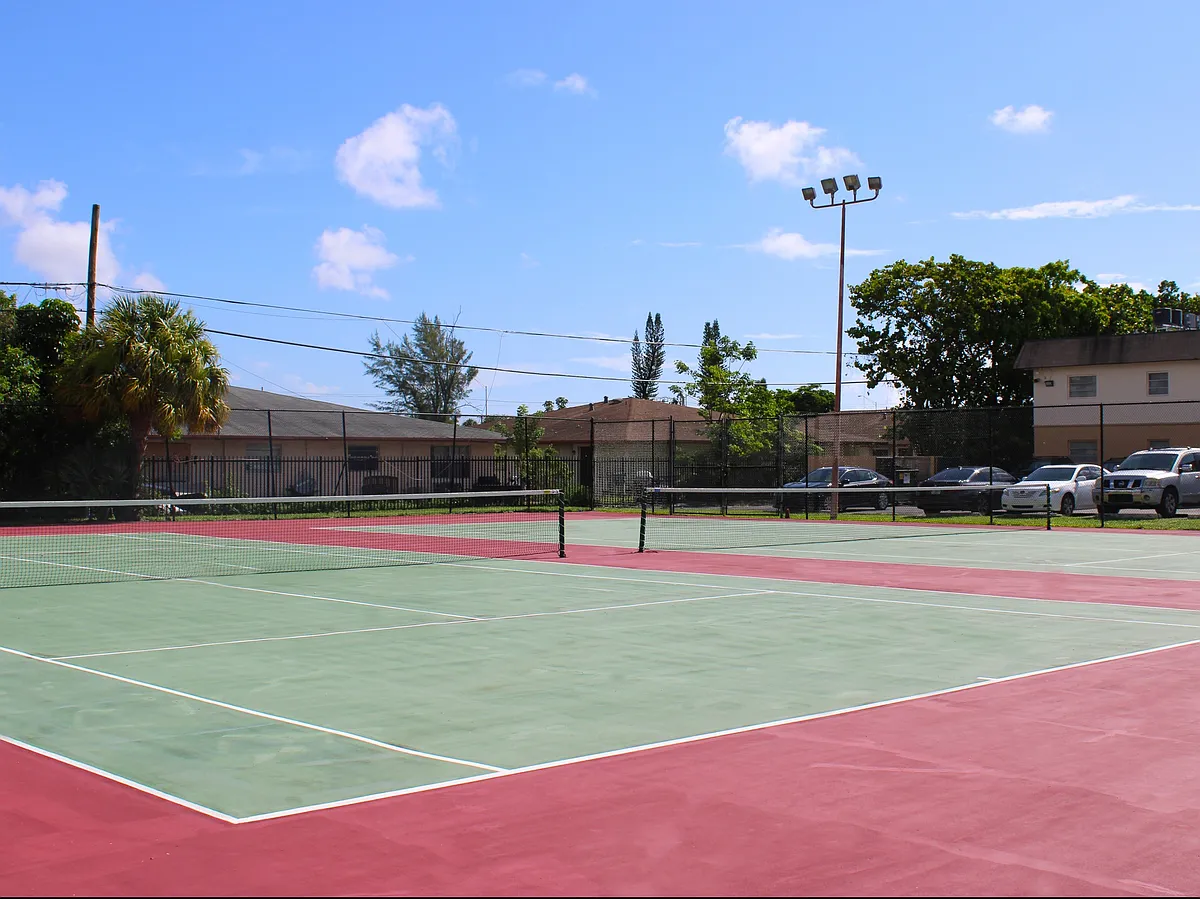 Tennis Courts - Pompano Palms Apartments