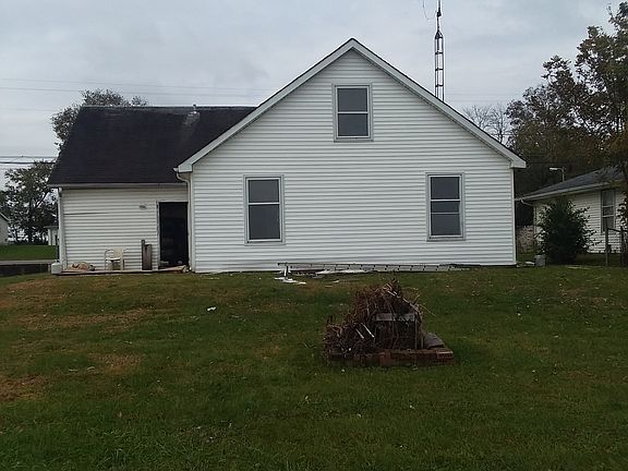 back of house with patio