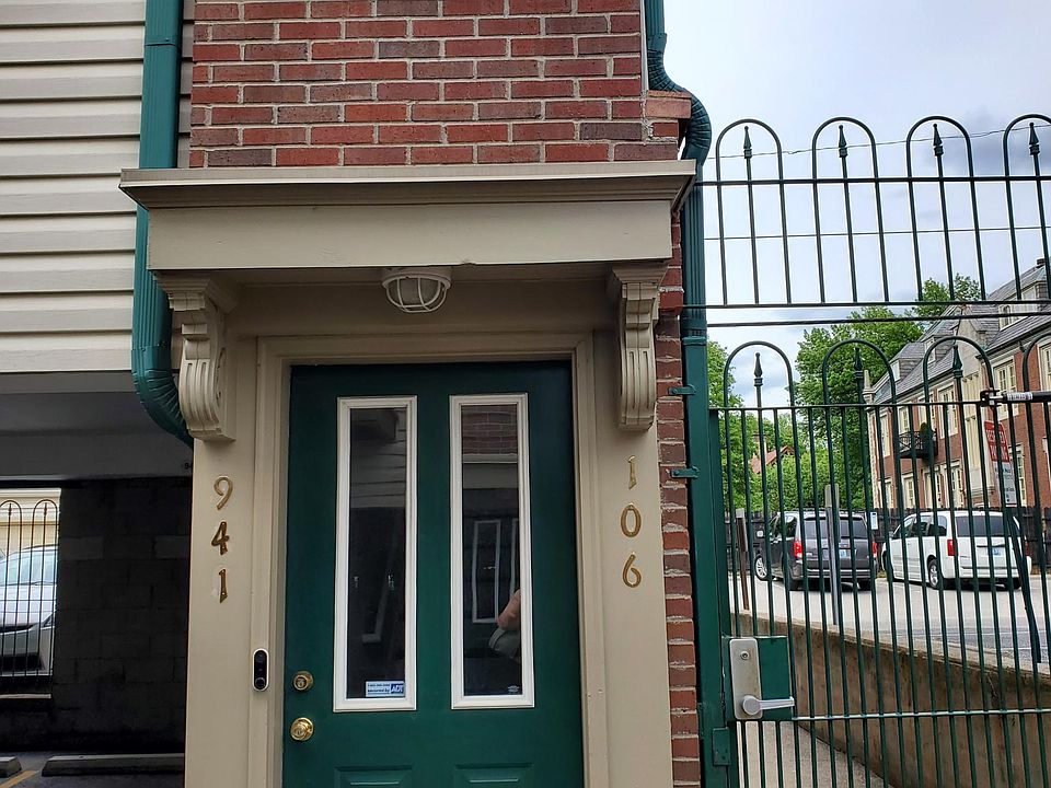 Gate entrance to the right of the door with a code into the community