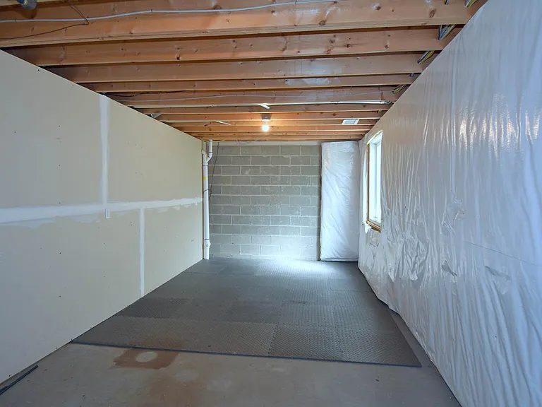 Unfinished lower level offers lot of storage space