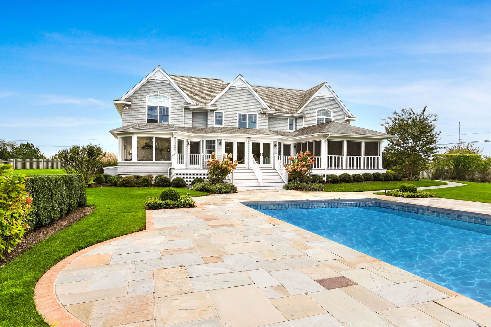  Rear view with deck, patio & pool