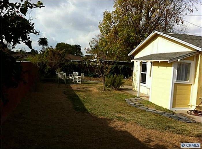 Mid yard facing rear