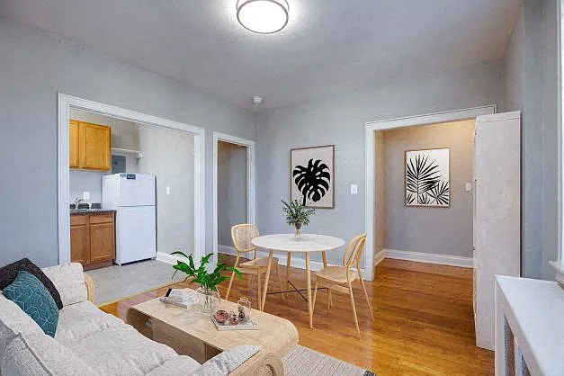 One-bedroom living and dining (virtually staged)