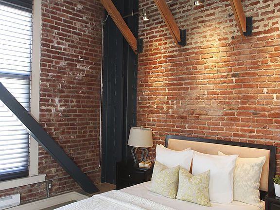 Exposed brick and wood beams