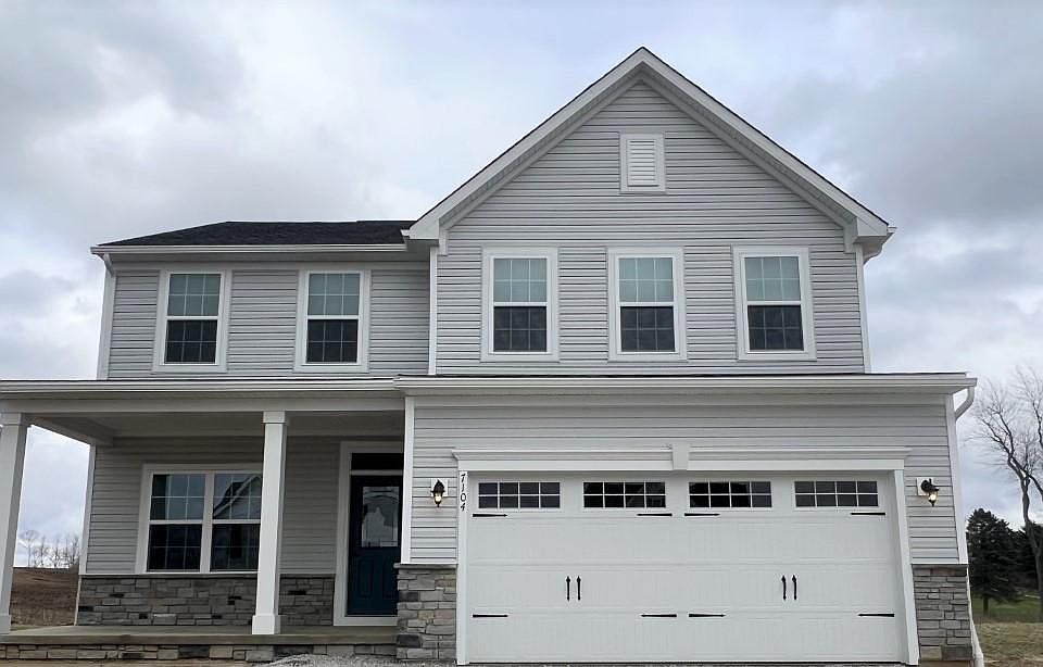 Front of brand new 2 story home with finished basement.