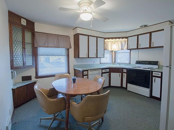 Spacious eat-in-kitchen with corner built in cabinet. All appliances stay with the home