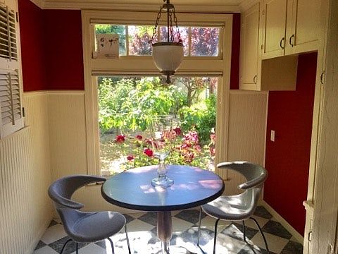 Breakfast nook overlooking roses and orchard