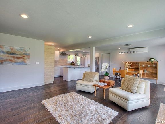 Enter house into great room concept living space with abundant light and flex spaces