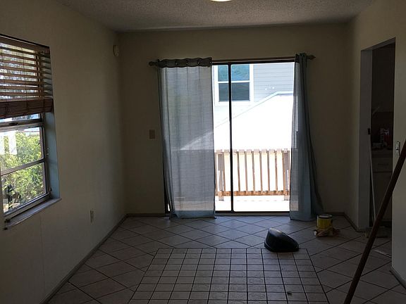 Dining area looking out to deck and bay