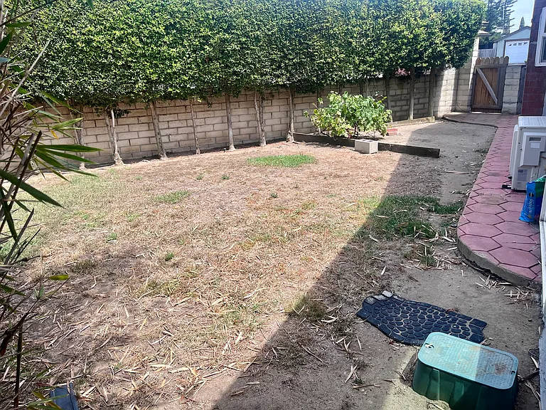 Side Yard Facing Towards Front Of Home