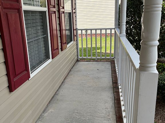 Add a couple of Rocking Chairs to this Front Porch!