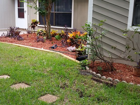 Brick steps lead to door