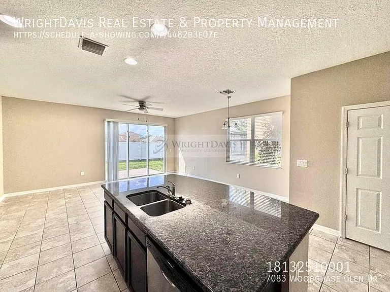7083 Woodchase Glen Dr — Photo 7