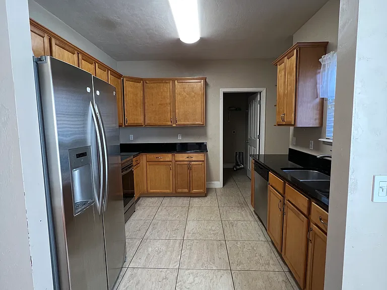 Kitchen with laundry room entrance