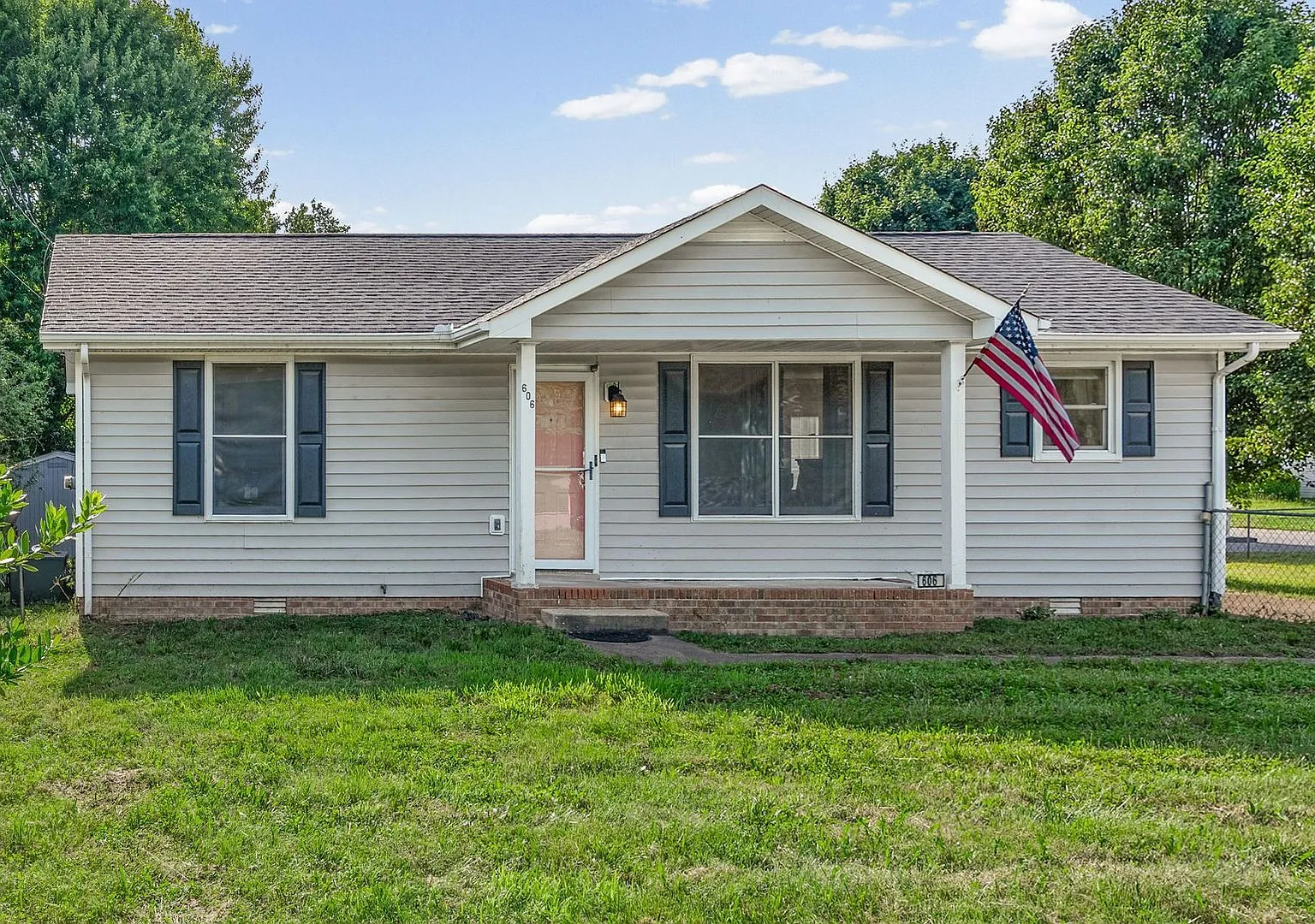 Spacious Home with Large Fenced Yard & Storage Shed — Photo 1