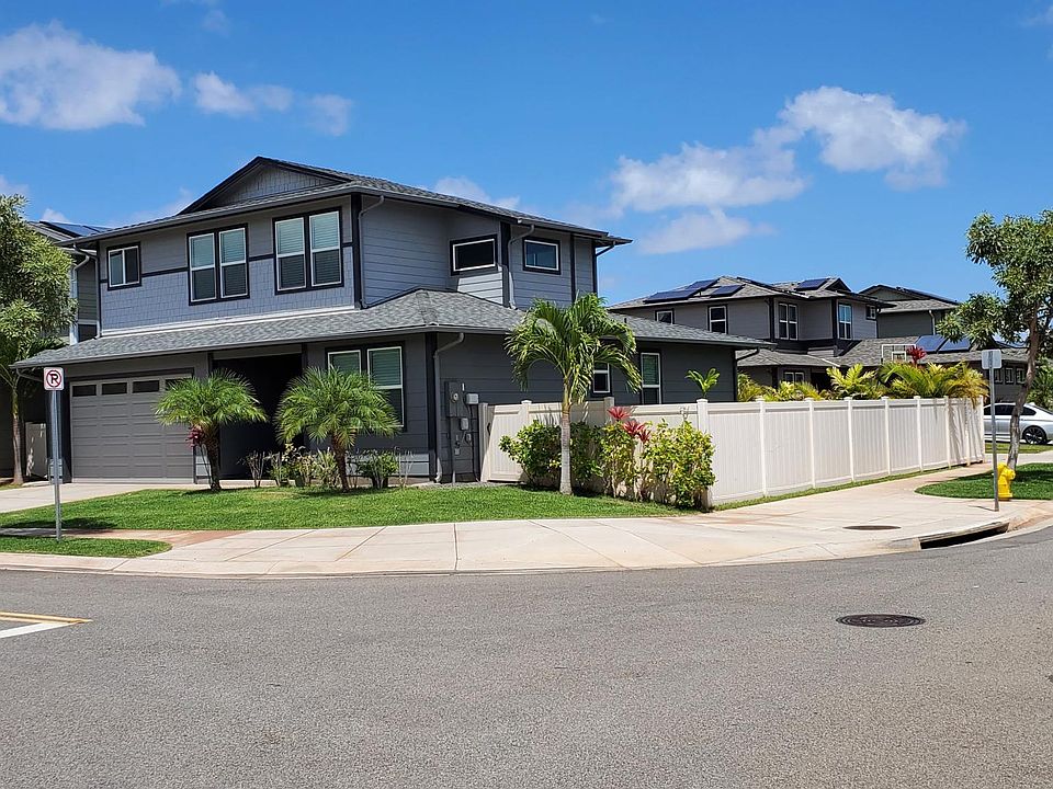 Large Corner Lot you are able to walk around the whole house (NOT zero lot or the house does NOT sit on one side of the yard). Private Yard Fully Fenced w/ Areca Palms to provide privacy. ONLY 1 neighbor near by on the left side.