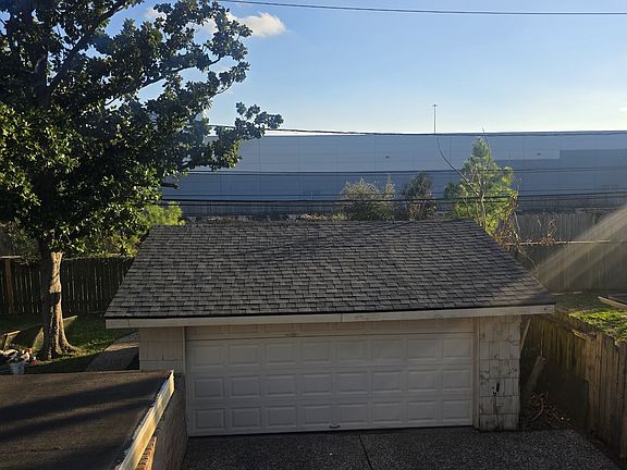 2 cars detached garage with new opener and remote.