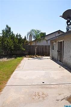 Full length cement patio.