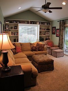 Completely updated family room with recessed lighting & loads of natural light
