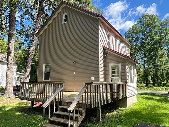 Back of house with large porch