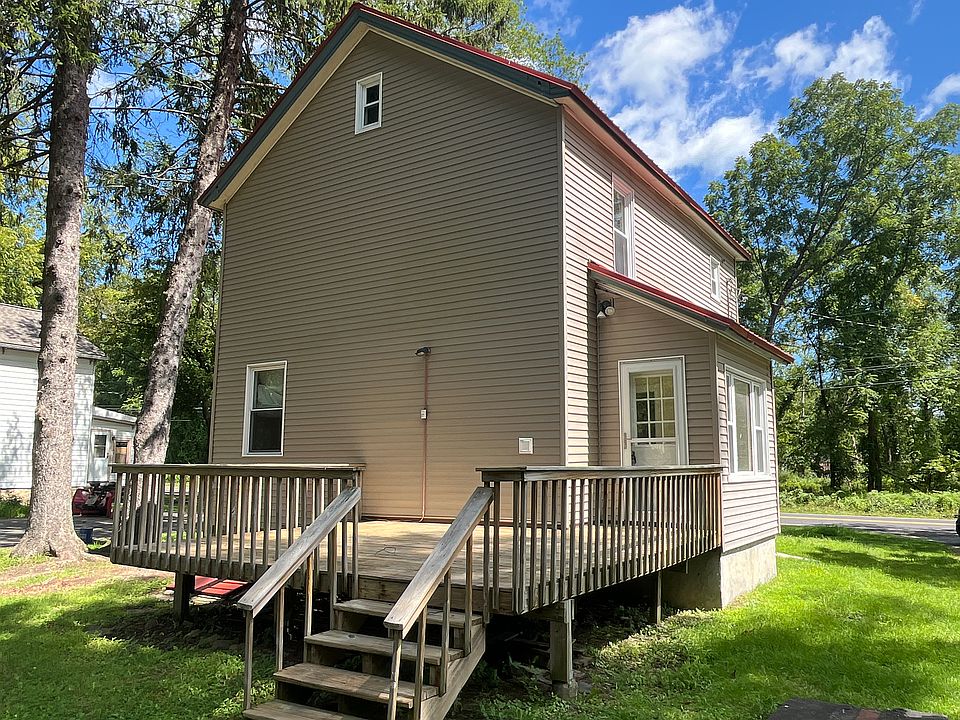 Back of house with large porch
