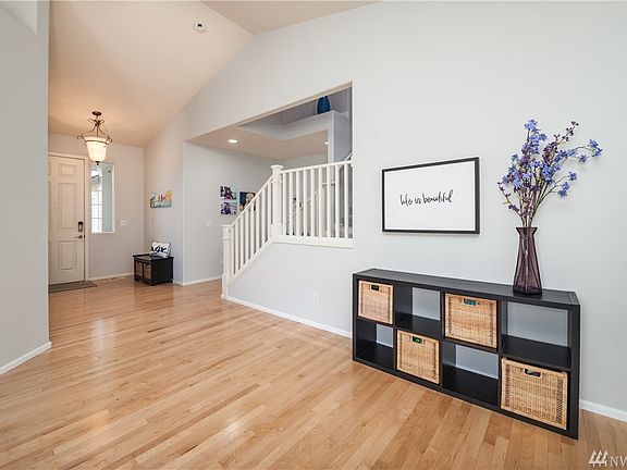 Vaulted ceilings in entry and living room