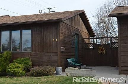 Welcome Home.....
						:
						front/side entrance with a decorative gate to the back yard.
