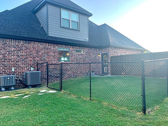 Fenced area off 3rd Garage