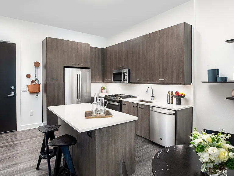 48 in. cabinetry offered in 3 palette options with complimenting wood style flooring throughout.