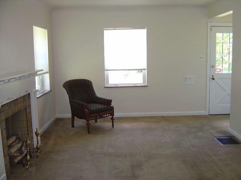 Roomy living room with coat closet