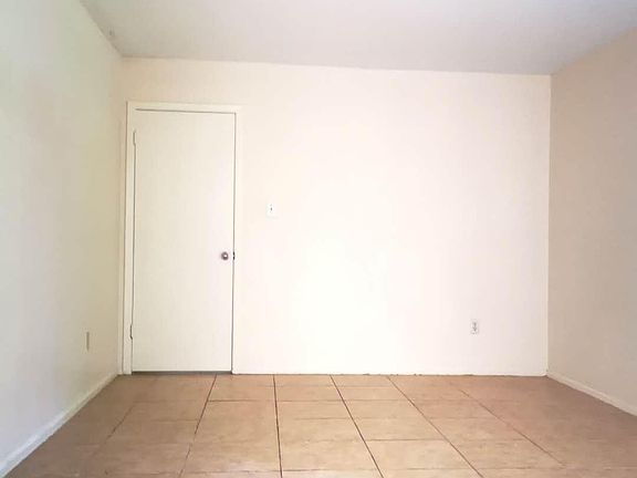 Dining room is on right side of the entry.