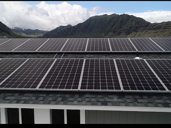 Solar panels cover entire roof. Drastically reduces home energy expense.