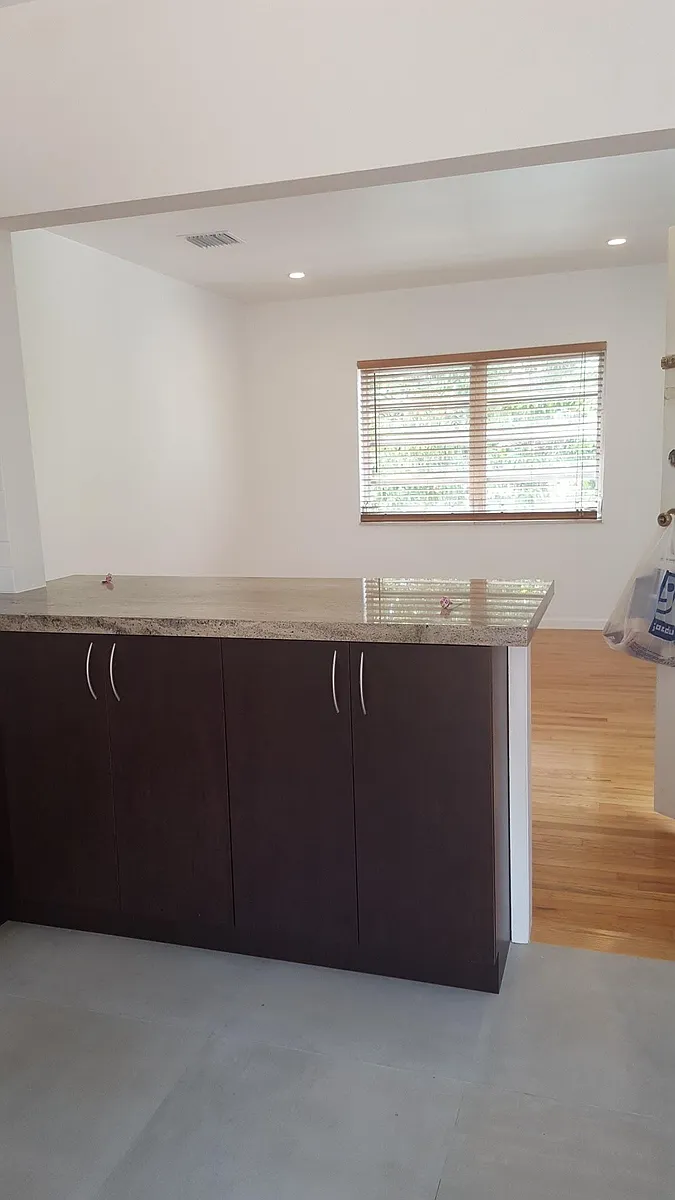 Kitchen counter and living room - 3783 SW 27th Ter