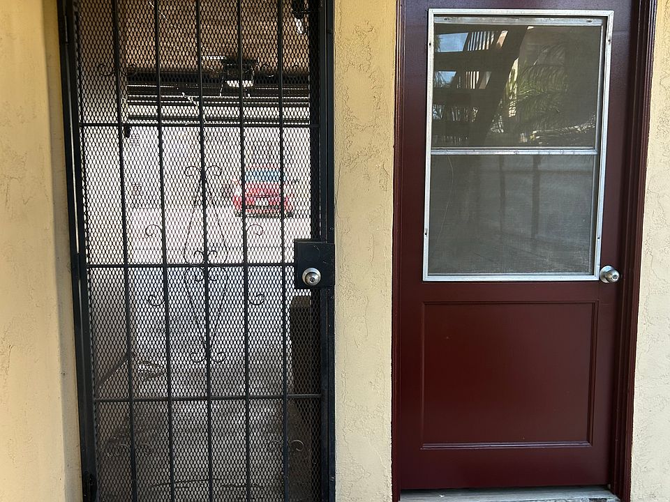 Laundry room and view to garage parking