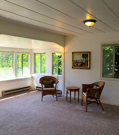 Originally a front porch and now an extension of the living room