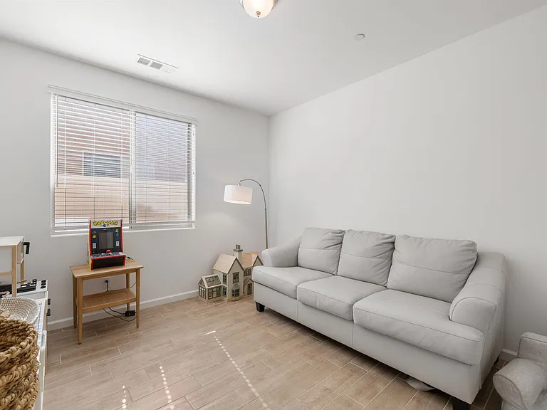 This sofa has been moved to the living room so this room can be used as 4th BR or Office