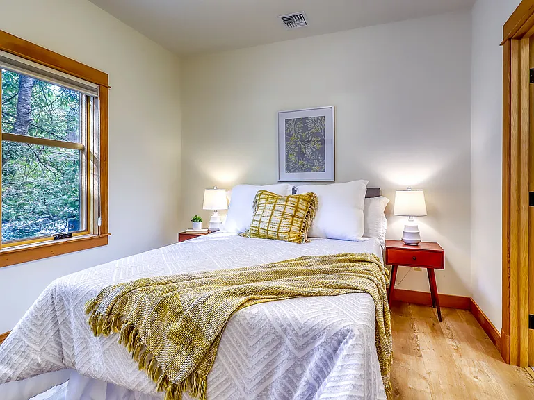 Guest Bedroom (first floor unit, same floor plan/dimensions) queen bed