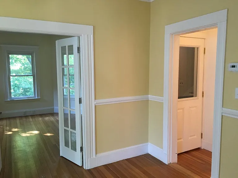 Dining Room, looking into the Living Room and the Hallway