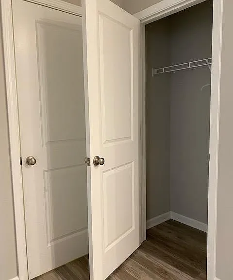 Attached garage door and coat closet