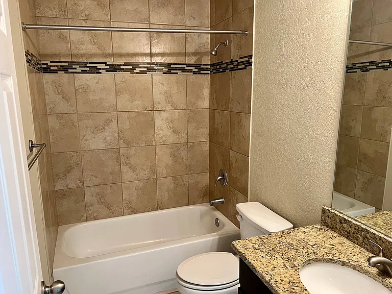 Shared Restroom - Sink, Toilet, Tub