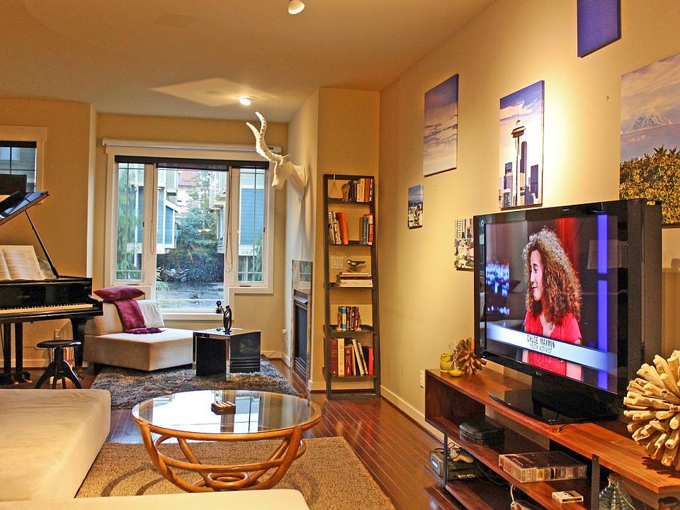 Spacious living room with modular sofa, big screen TV, Petro