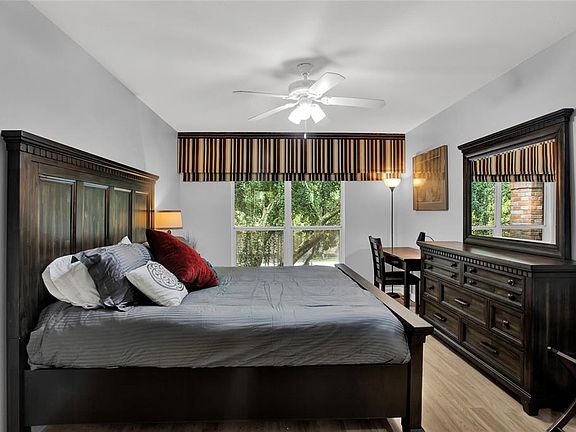 View of Bedroom with king bed when staged and nicely furnished.
