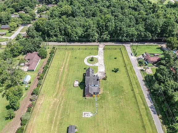 Listing includes the house and 1.37 acres. The rest of the 1.9+ acres is being sold for an additional price but with first right of refusal to the buyer of the house.