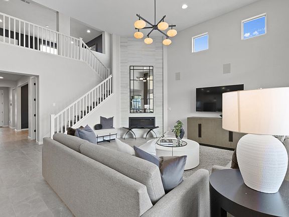 Entertain in the large gathering room that is open to the kitchen.